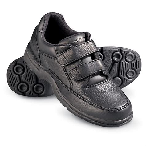 black sneakers with velcro straps